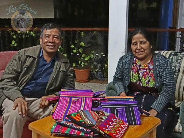 Guatemalan artisans with Las Casas snap bags