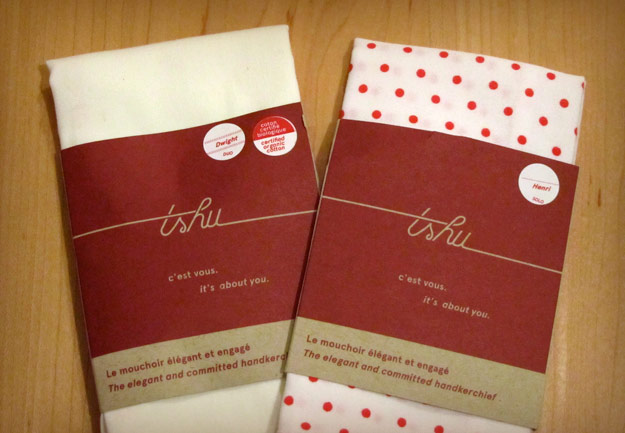 Two TSHU handkerchiefs in cardboard sleeve packaging