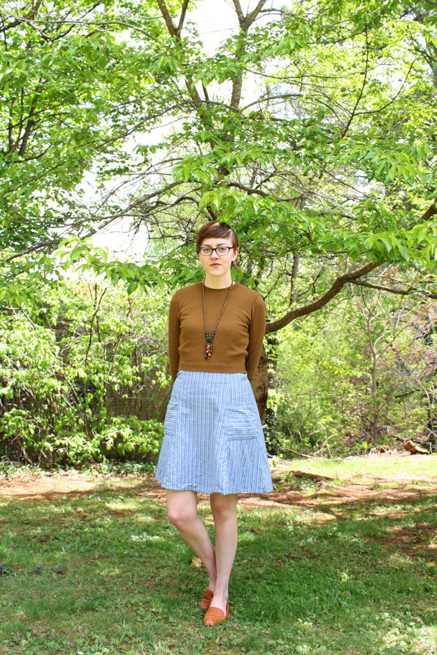 Leah in blue Mata Traders dress and brown sweater