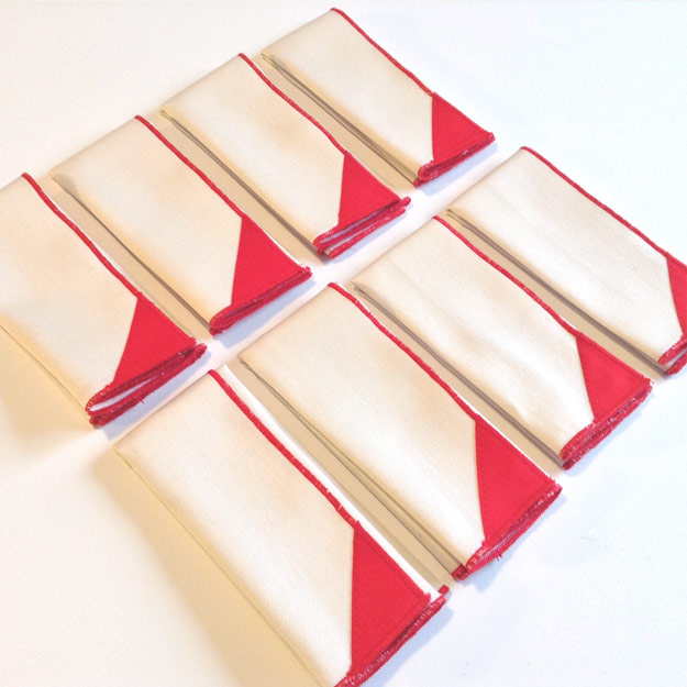 Eight natural handkerchiefs with red corners