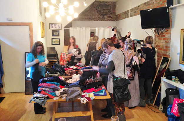 Women perusing clothing at Spring Swap 17