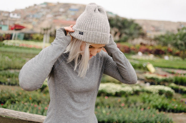 Woman wearing gray beanie
