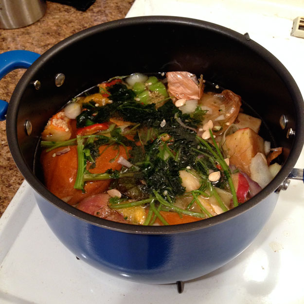 Vegetable scraps in pot with water