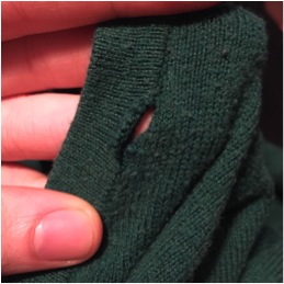 Hole in sweater