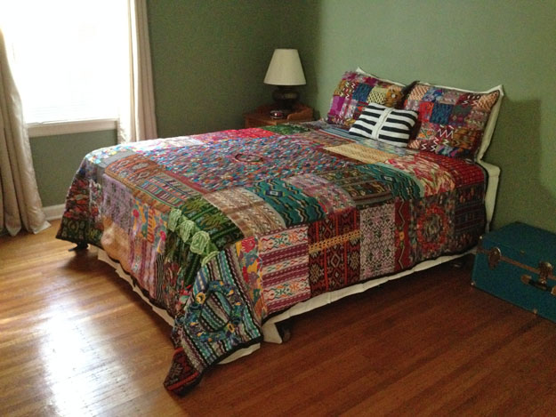 Bed with Guatemalan fair trade quilt