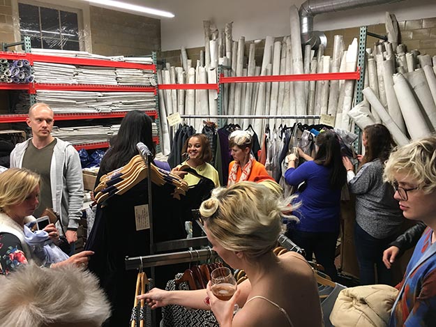 People shopping in a warehouse setting